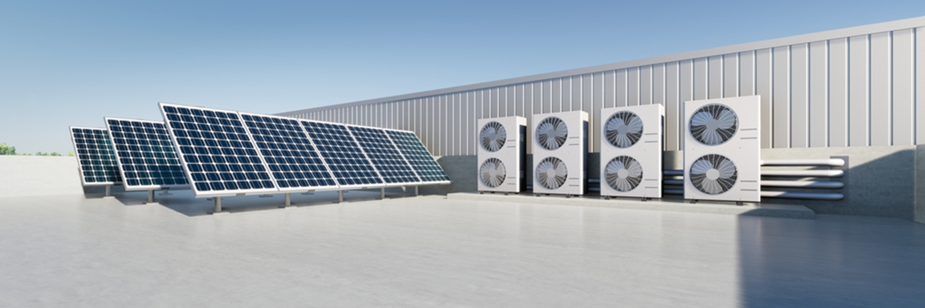 Commercial rooftop solar panels installation with HVAC units on industrial building under clear sky, professional solar energy services for businesses