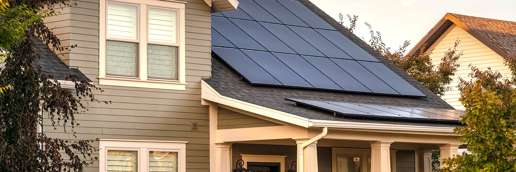 Residential home with professionally installed rooftop solar panels by Ryan Electrical Solutions, providing clean, renewable energy and lowering utility costs