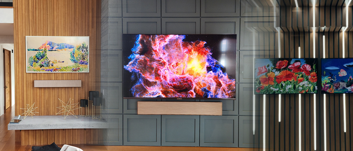 Modern living room with professionally installed wall-mounted TV and home theater electrical setup, Residential electrical services for entertainment system installation